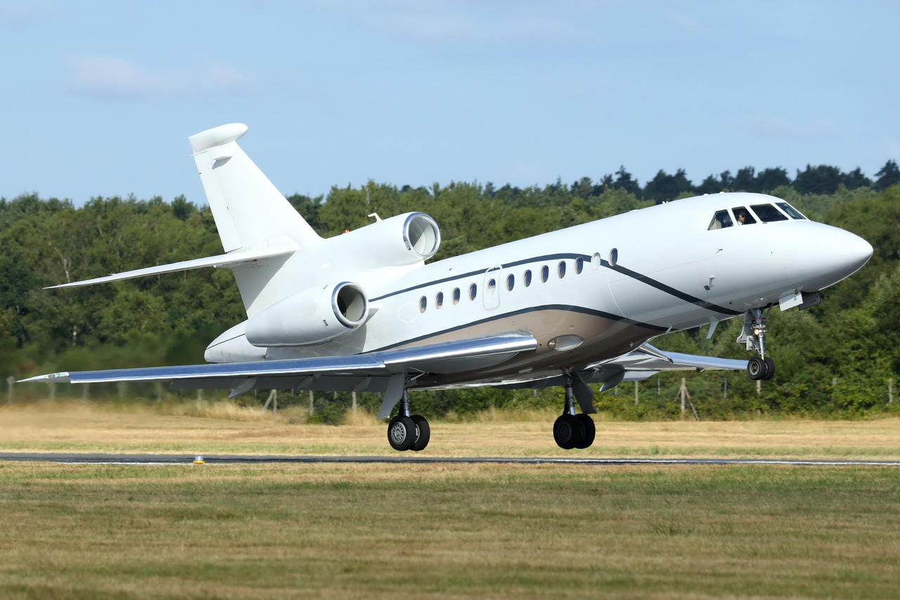 Falcon 900DX private jet charter'