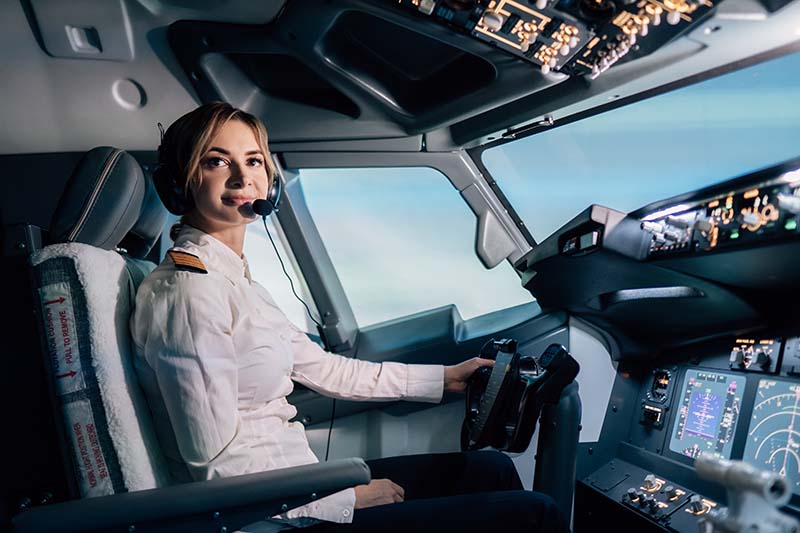 Female Pilot in Cockpit